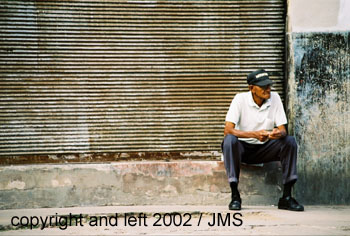 man_sitting_closedshop